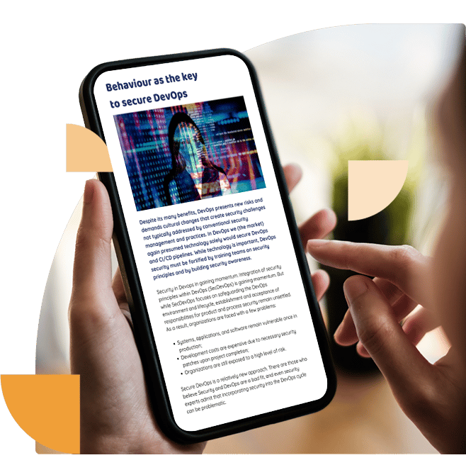 Person holding an iPhone and reading the first page of a whitepaper called “Behaviour as the key to secure DevOps”